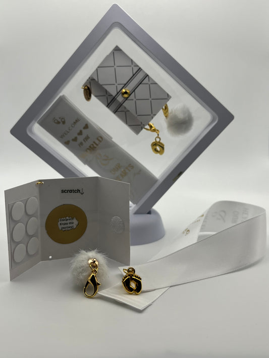BABY SHOWER - “Welcome to the world & our hearts” – White Satin Reusable Adhesive Book-It™ Bookmark with Two Charms (Baby Feet, White Pompom) in Gift Box + Hidden Scratch Gift Message