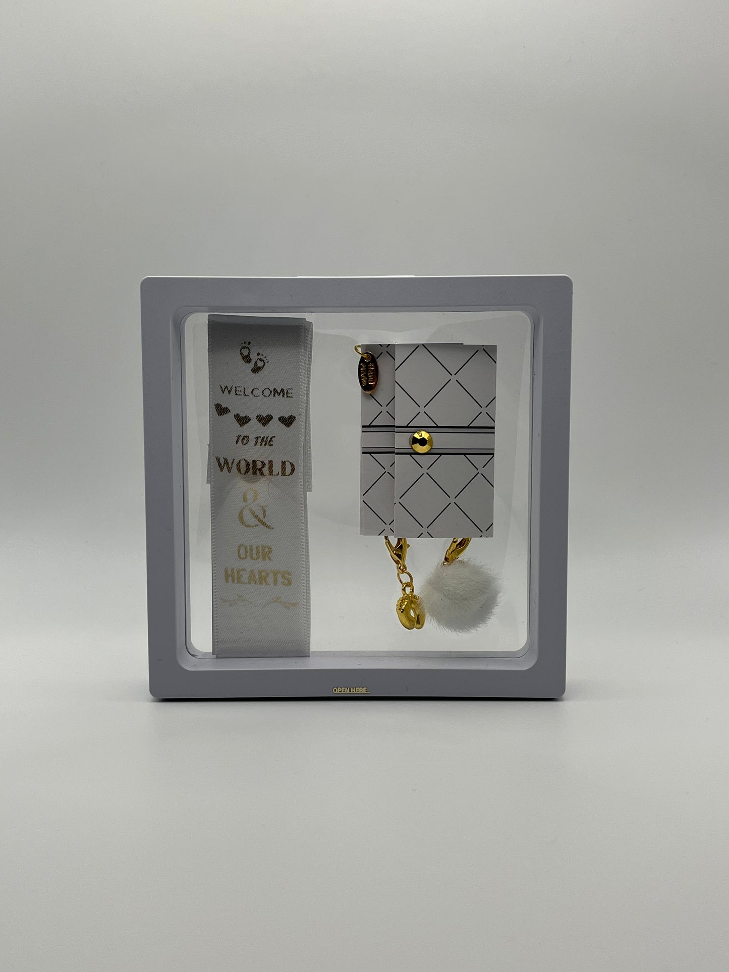BABY SHOWER - “Welcome to the world & our hearts” – White Satin Reusable Adhesive Book-It™ Bookmark with Two Charms (Baby Feet, White Pompom) in Gift Box + Hidden Scratch Gift Message