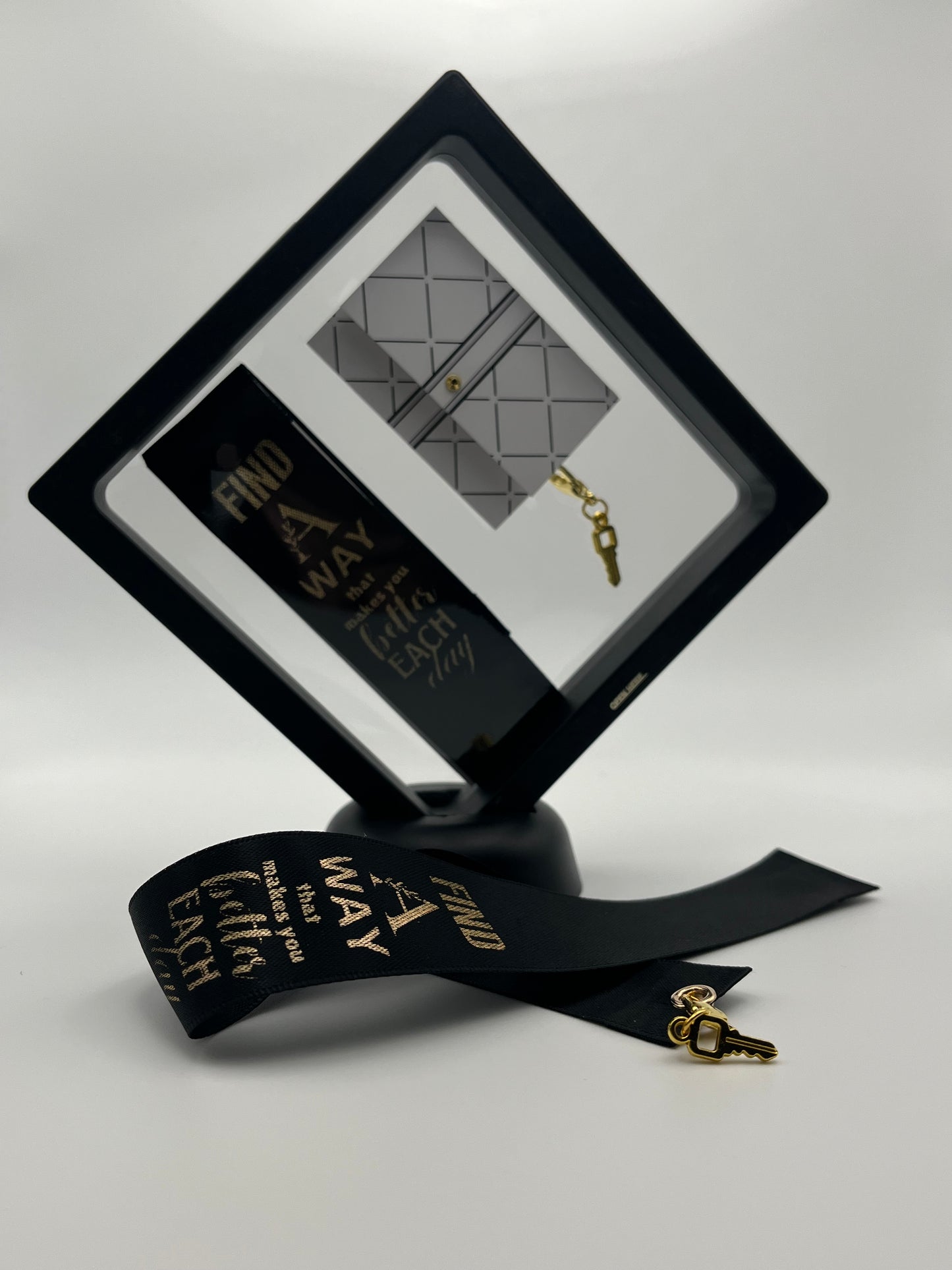 MOTIVATIONAL - “Find a way that makes you better each day” – Black Satin Reusable Adhesive Book-It™ Bookmark with a Charm (Gold Key) in Gift Box