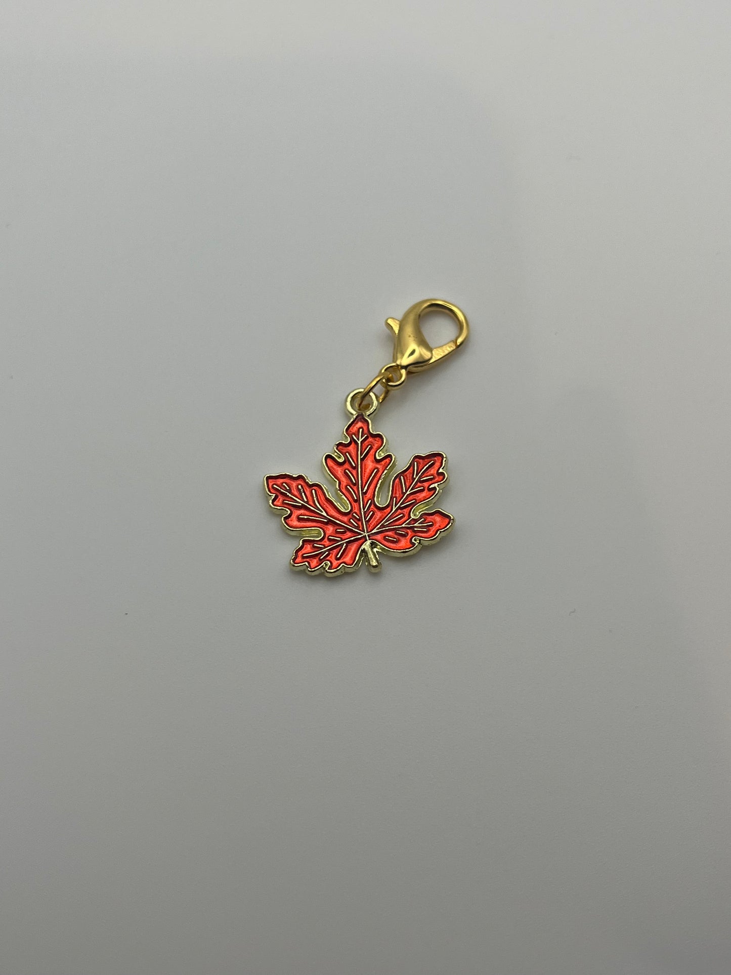 “CANADA, eh?” – Red Satin Reusable Adhesive Bookmark with a Charm (Canadian Maple Leaf) in Gift Box