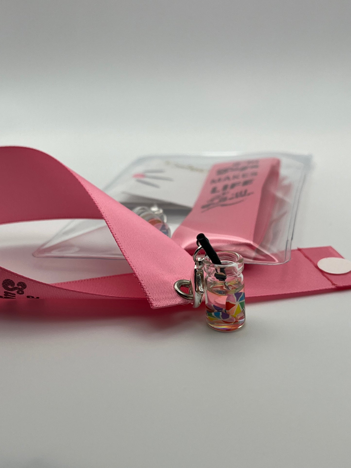 LIFE SWEETNESS – “A ‘lil suga makes life a ‘lil sweeter” - Pink Satin Reusable Adhesive Book-It™ Bookmark with a Charm (Candy Cup)