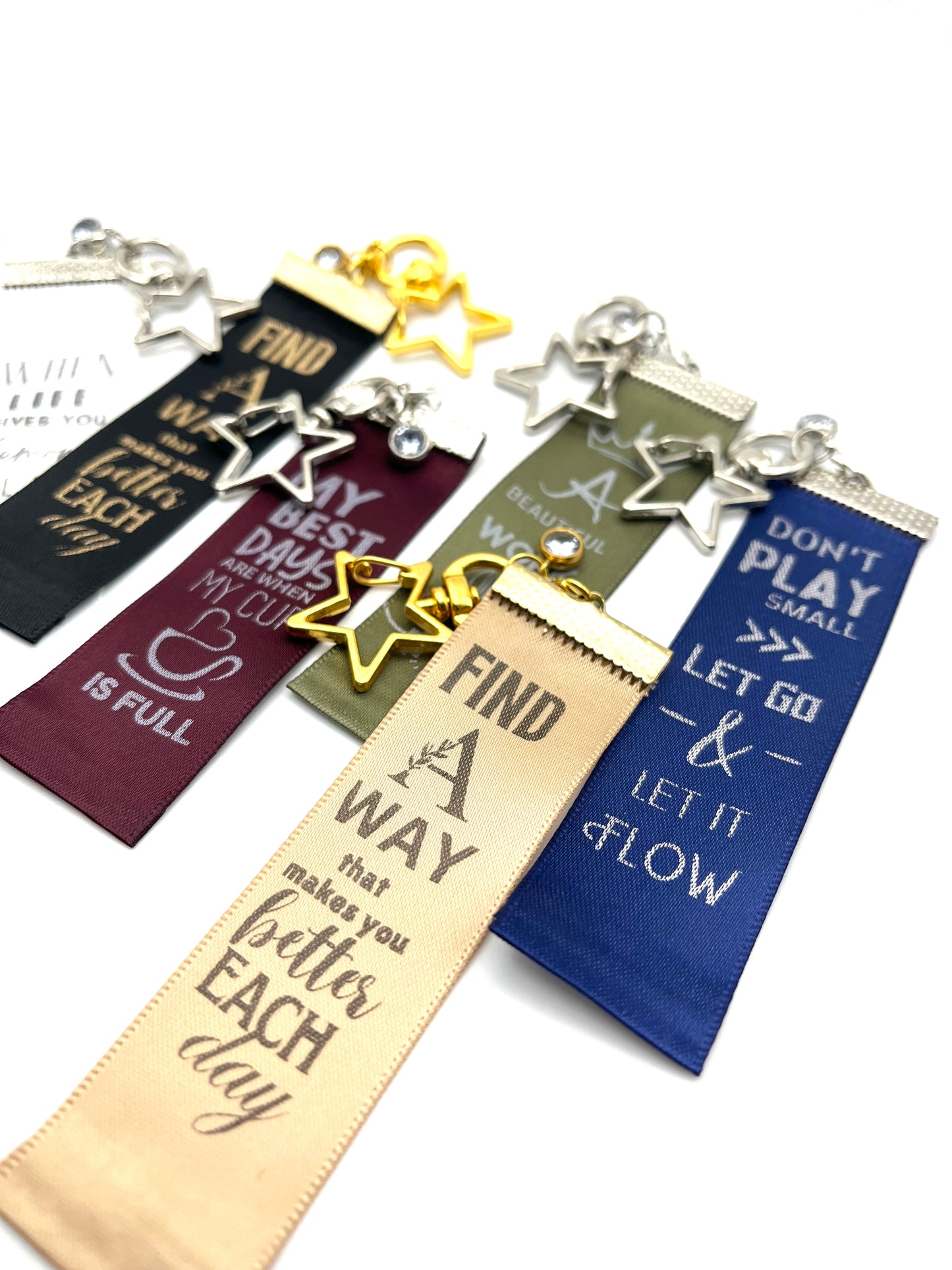 Don’t Play Small, Let Go & Let it Flow – – Inspirational Keychain Gift - Navy Ribbon with Silver Text - Silver Swivel Star Keyring and Gem